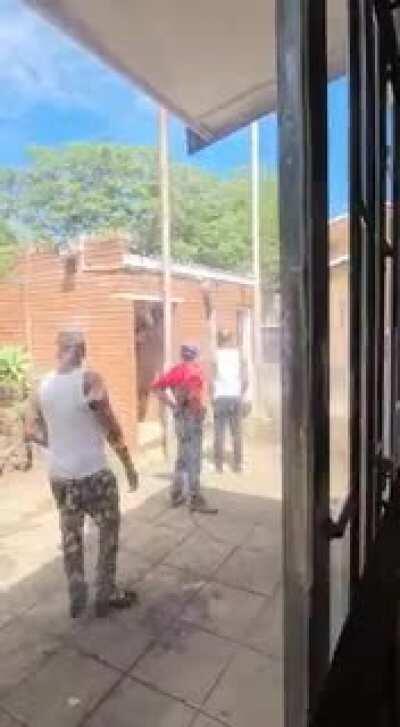 Attempt hijack 4. Hi jackers standing outside police station calling for them to come out.