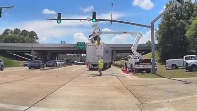 Electrical worker gets struck by top of 18-wheeler. He suffered only minor injuries