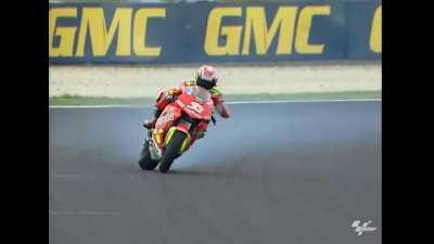 Melandri's one-handed slide through the corner