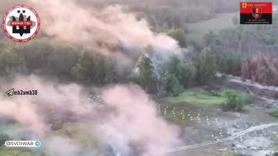 Ukrainian BMP blasting Russian position in tree line guarded by dragon’s teeth