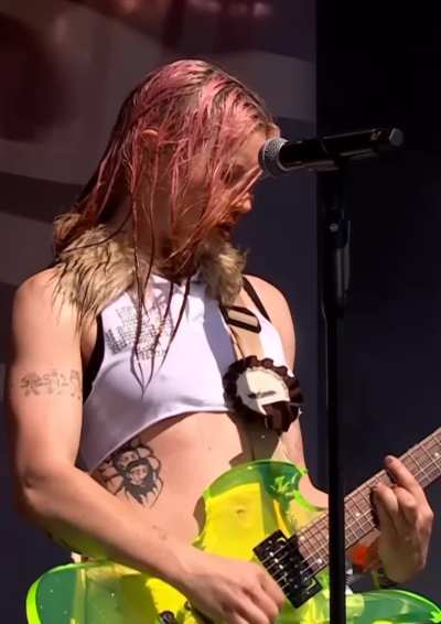 Lead singer of the band Wet Leg performing at Glastonbury this year