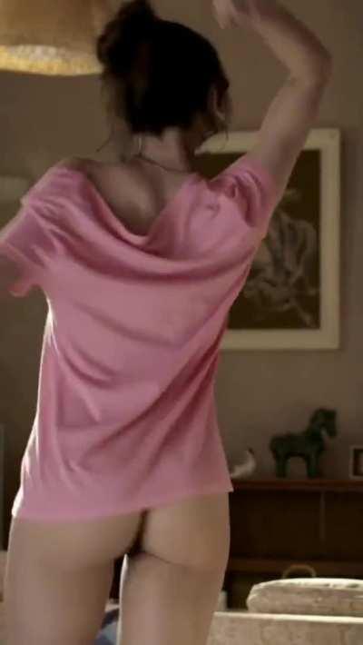 Hanging up the phone with your friend, his girlfriend comes over to ask what he wanted before going back to finish making breakfast. [Nathalie Emmanuel]