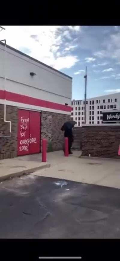 Minneapolis: protesters confront alleged police agent provocateur vandalizing property. Interesting how he dressed himself similar to a Hong Kong rioter: black clothing, gas mask, umbrella
