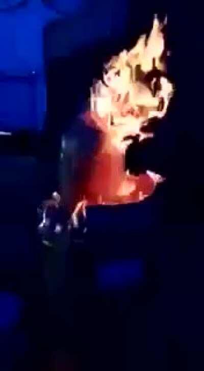 Dumbass diving in a water/fire barrel