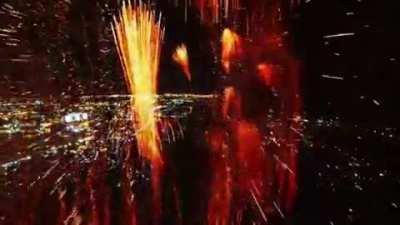 be mesmerized r_gif what could go right Drone flying through some fireworks.
