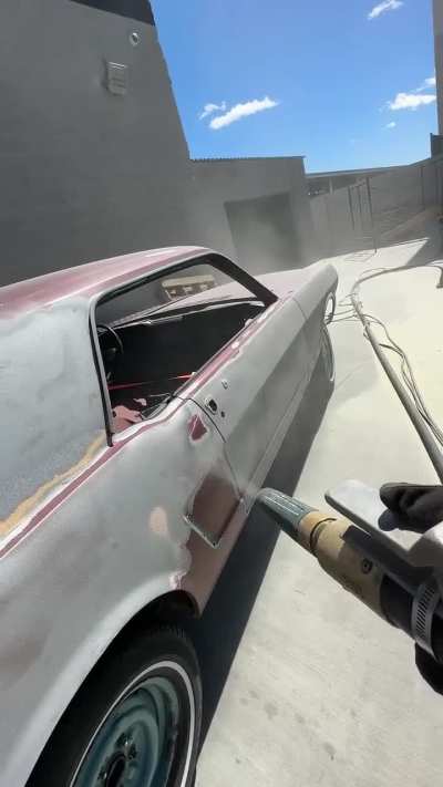 Sand Blasting An Old Car To Remove Paint