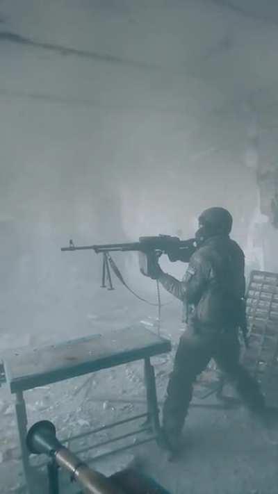 Ukrainian fires machine gun and rocket launcher from a building in Bakhmut, December ‘22 (music from source)