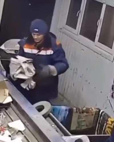 This guy saving kitten from trash cutting machine .