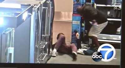 Man eating Cheetos sucker punches someone inside a Best Buy and steals their phone.