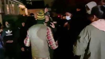 BLM protests in a residential neighborhood. Resident asks crowd not to mess with his lawn and points to his Biden sign to show he is on their side. Is informed that no one cares about his white ass opinion