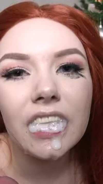 Beautiful redhead playing with cum