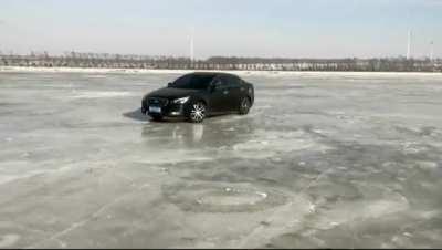 Filming a car driving towards you on ice