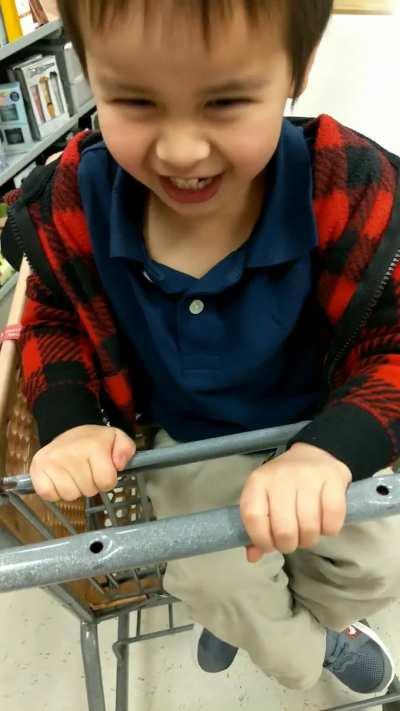 My son kept trying to get me to move my hand from the shopping cart, so we played a little game :)