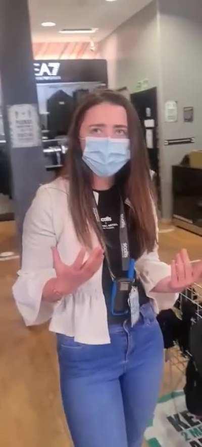 Shop worker starts crying because she asked a customer if he would like a mask and he started filming her