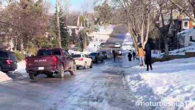 ICE agents mocked mercilessly by neighborhood as vehicles get stuck on an icy hill in Minneapolis. Agents almost fall down several times