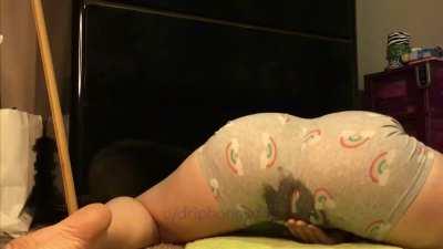 Squirting through her pants