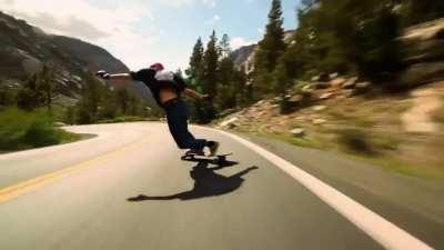 hold my redbull qhile i film this insane longboarder with balls of steel.