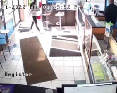 Woman tries running out of the store without paying after getting her phone fixes