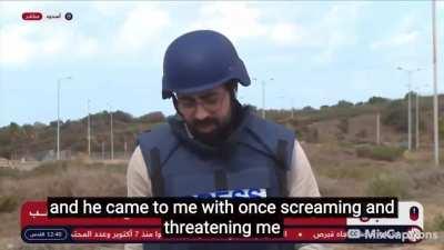 Israeli Policeman Threatens and Intimidates a Reporter Live On-Air and Demands that he 