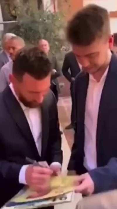 When you have a chance at getting Messi's autograph but...