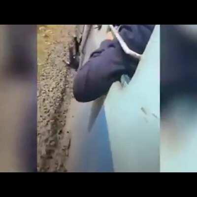 Idiot tries to jump off moving train