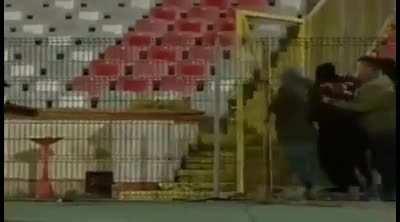 Idiots fighting a gate