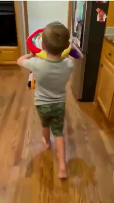 kid gets fluffy toy of his drawings