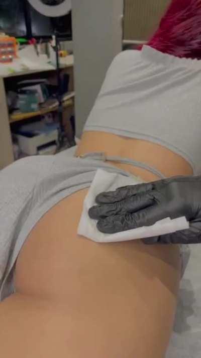 BITE ME tattoo on her ass Close up view