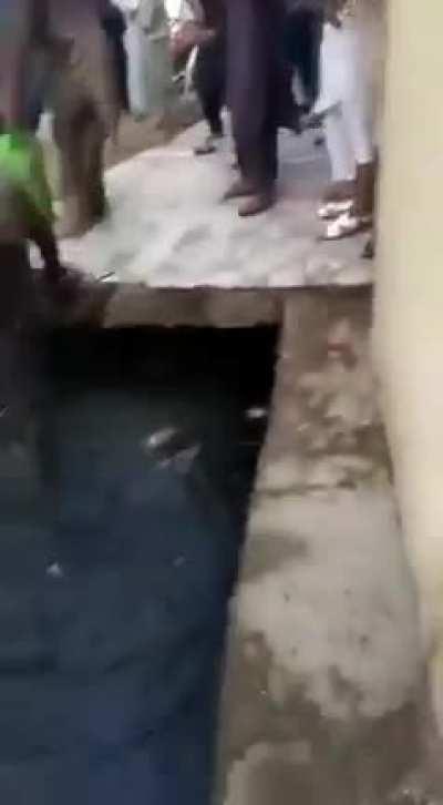 Food shortage leds to food war in pakistan. People are throwing each other in sewage.