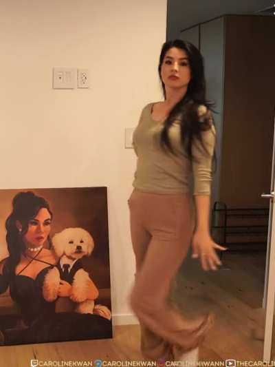 caroline doing an impression of an influencer at a party