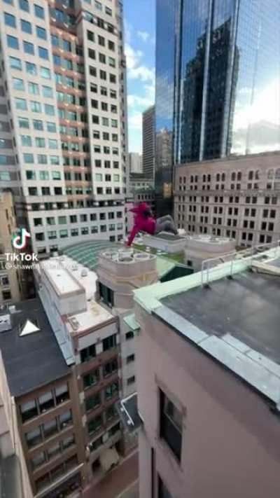 Front-flipping across buildings in Boston