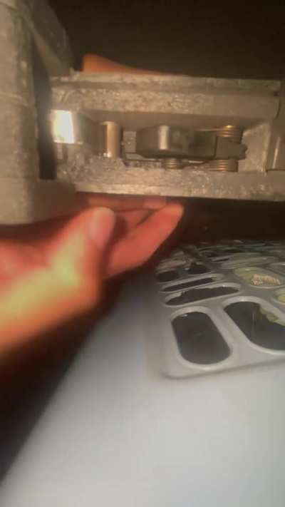 Cam resets on its own from holding the trigger