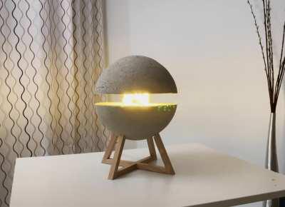 I made a raising concrete sphere, I see it as practical art that serves as lamp. What do you think? [10kg heavy]