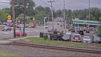 Trucker flies through stale red and takes out three vehicles in New Jersey [OC]