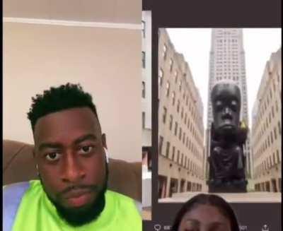 Revealing of a statue honoring African culture.