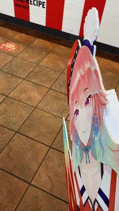 Absolute sigma male brings his anime girl cutout to get KFC.