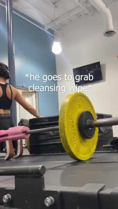 Influencer records man in gym while muttering to herself and staring at him; accuses him of being creepy when he glances at her and later offers to help her adjust her weights correctly