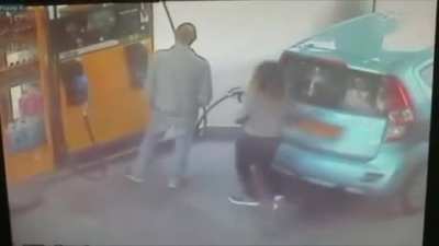 Woman asks man for a cigarette, he refuses, so she sets his car on fire