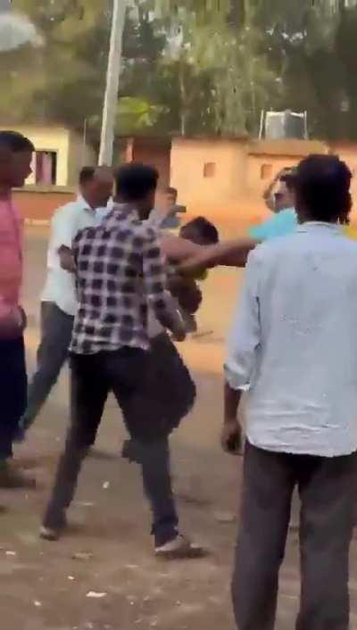 In Kankavli, Maharashtra, a Muslim guy was beaten up badly by Hindutva  terrorists forcing him to chant Jai Shri Ram, his wife and kids are crying and requesting mob to stop