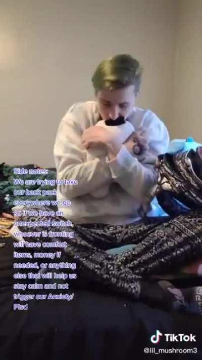 Person somehow can operate a phone while being an infant...