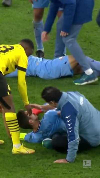 To check on the injured player