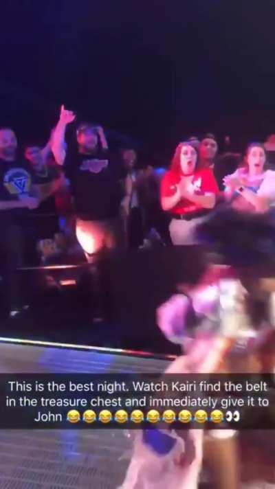Kairi Sane accidentally throws the NXT Women's championship into the crowd during her entrance