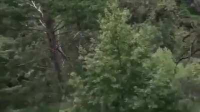 Somebody built a dirtbike track right next to a cliff!