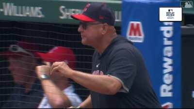 Gabriel Arias successfully nutmegs the catcher on a slide to score the Guardians third run of the game