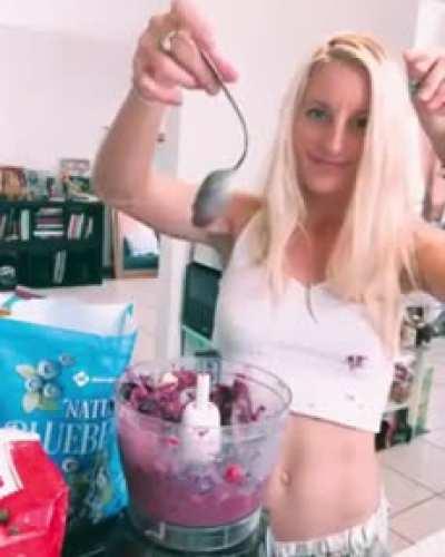 Putting a spoon in a blender