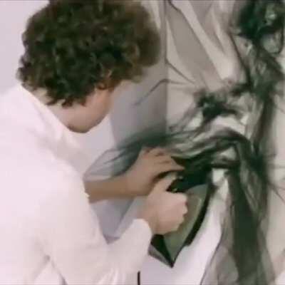 British artist Benjamin Shine folds and presses giant sheets of tulle fabric into beautiful abstract faces