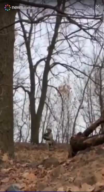 Russian films Ukrainians walking by