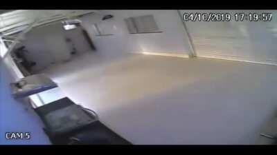 Old lady gets stuck inside a garage after biker leaves his house in Brazil