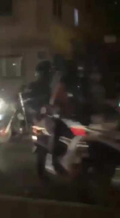 A woman filming the Iranian forces attacking college students is shot herself