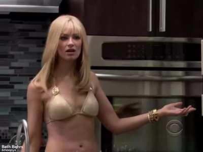 Beth Behrs in a bikini-top